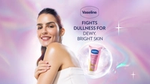 Vaseline Gluta-HYA product advertisement featuring a woman and the tagline "Fights dullness for dewy, bright skin".