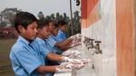 Children washing hands with Lifebuoy soap
