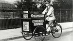 Black and white picture of a man on a Wall’s trike