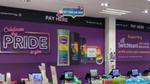 Large 'Celebrate the Pride in you' wall poster showing Pride branded personal care products, and Switchboard contact details