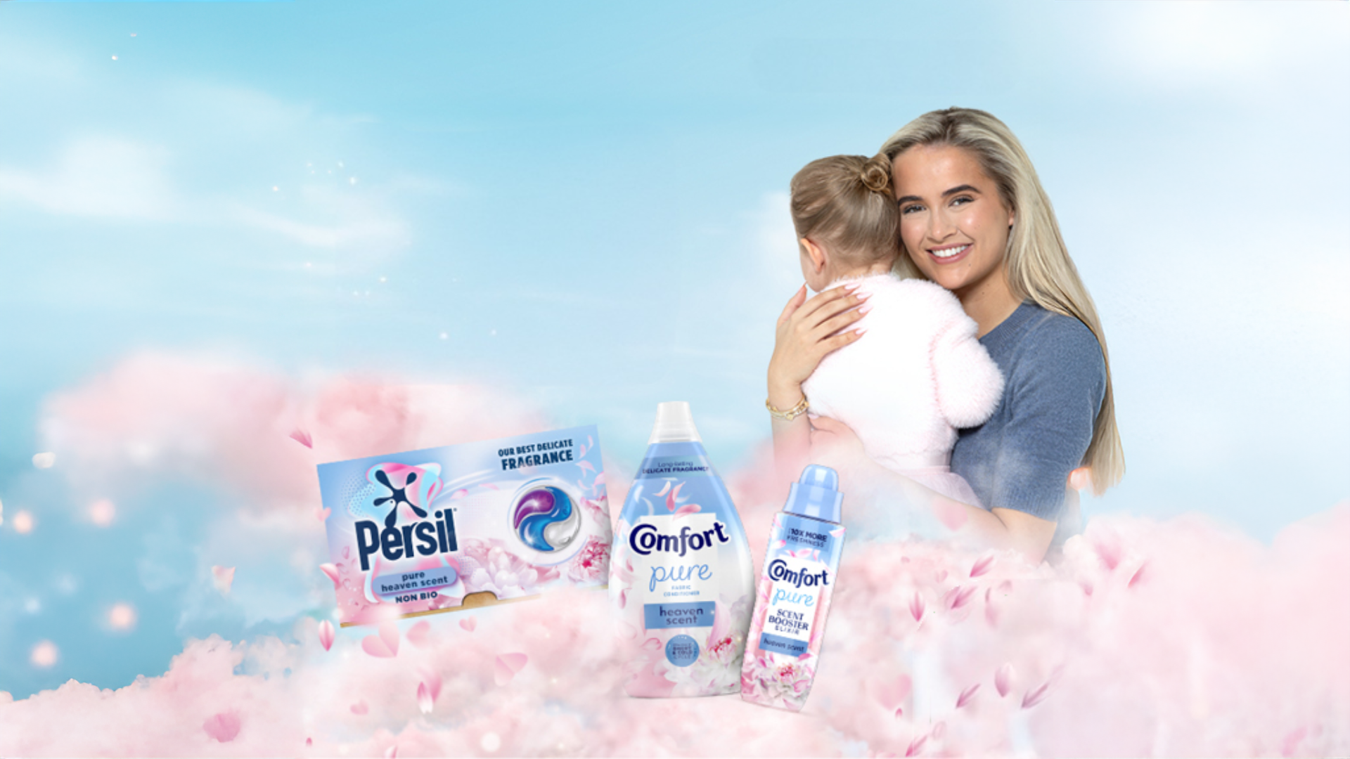 UK’s most successful influencers and mum, Molly-Mae Hague holding child with Persil and Comfort products