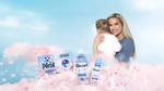 UK’s most successful influencers and mum, Molly-Mae Hague holding child with Persil and Comfort products