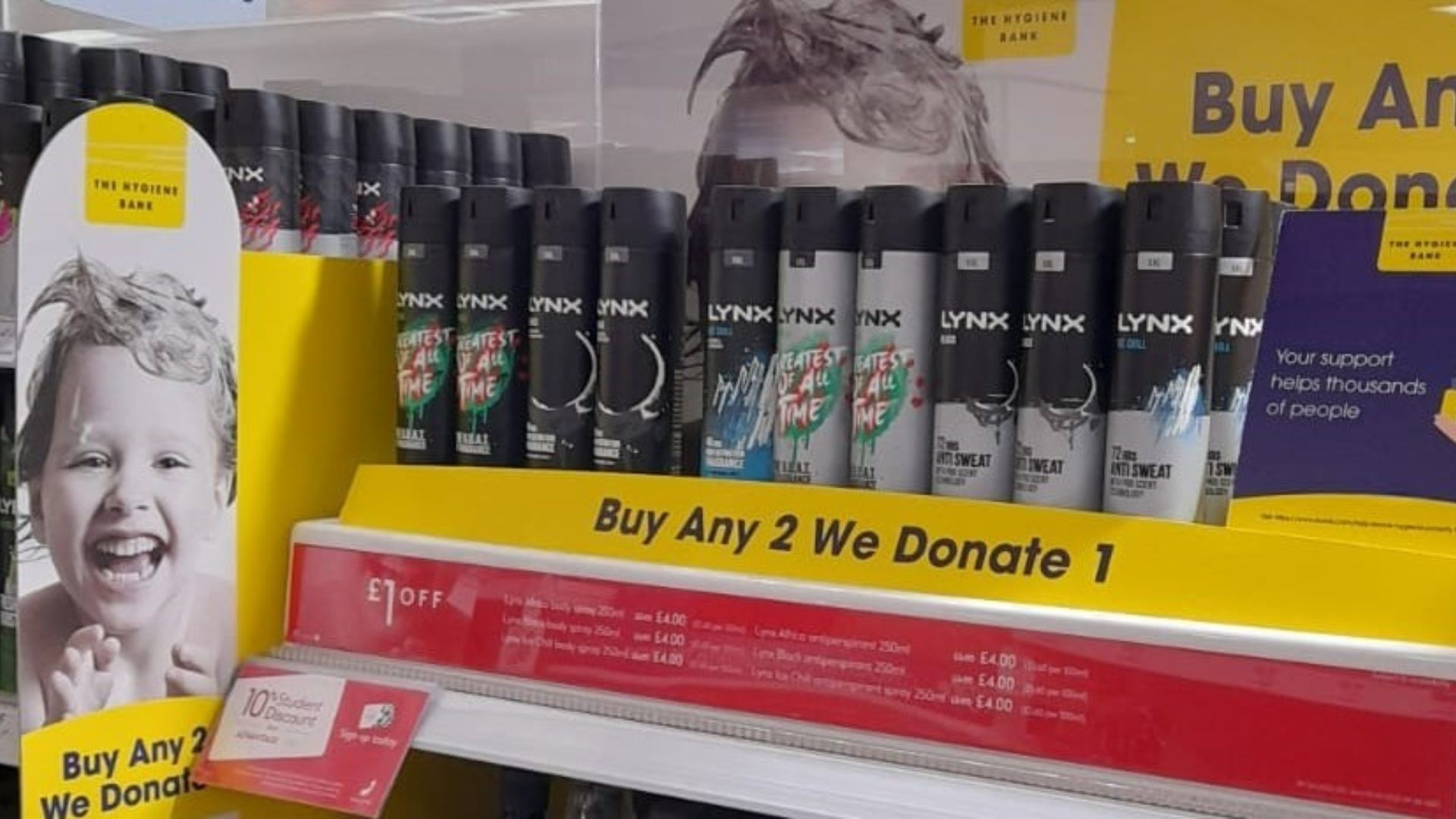 Lynx products with 'Buy Any 2 We Donate 1' on-shelf branding around them.
