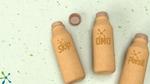 Graphic rendering of new Pulpex paper-based bottles showing the Skip, OMO and Persil logos.
