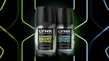 Two Lynx lower body spray bottles side by side, featuring Pear and Cedarwood scent, and Coconut and Sandalwood scent, against a neon background.