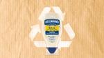 Hellmann’s plastic bottle with recycle sign in the background