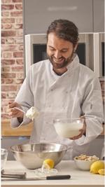 Ben & Jerry’s flavour guru João Piva in chef whites, choosing ingredients in a test kitchen