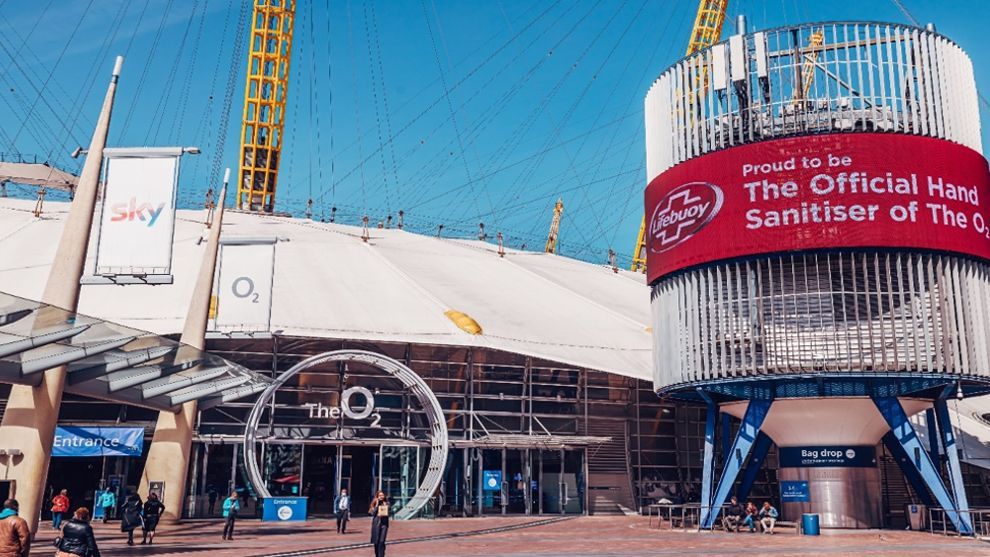 An image of the O2 arena with a digital display announcing Lifebuoy as the official hand sanitiser of the O2.