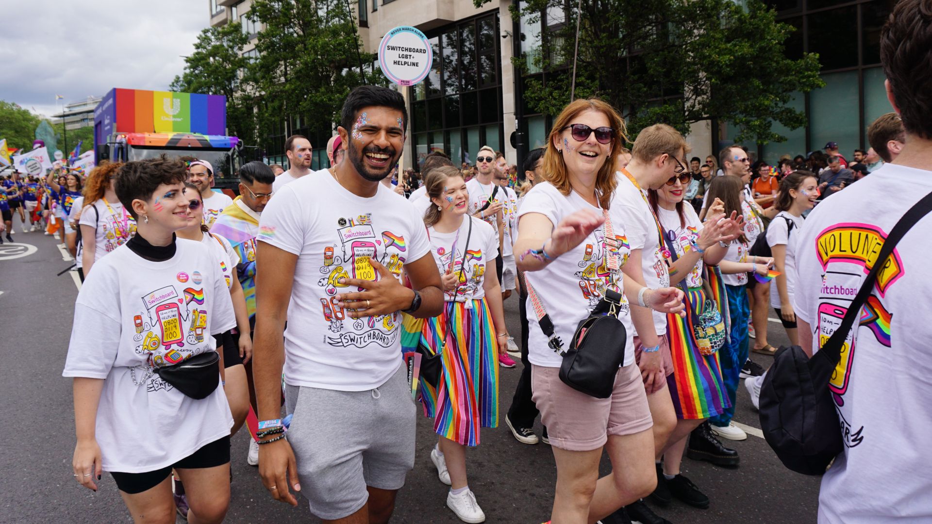 A group of people from Switchboard walking at Pride London