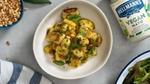 Image shows Gnocchi on a plate next to a tub of Hellmann’s Vegan Mayo